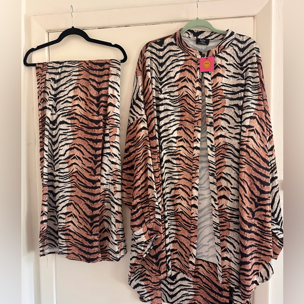 Dressed in LALA tiger print silken tops and pants set- Black, White, Orange